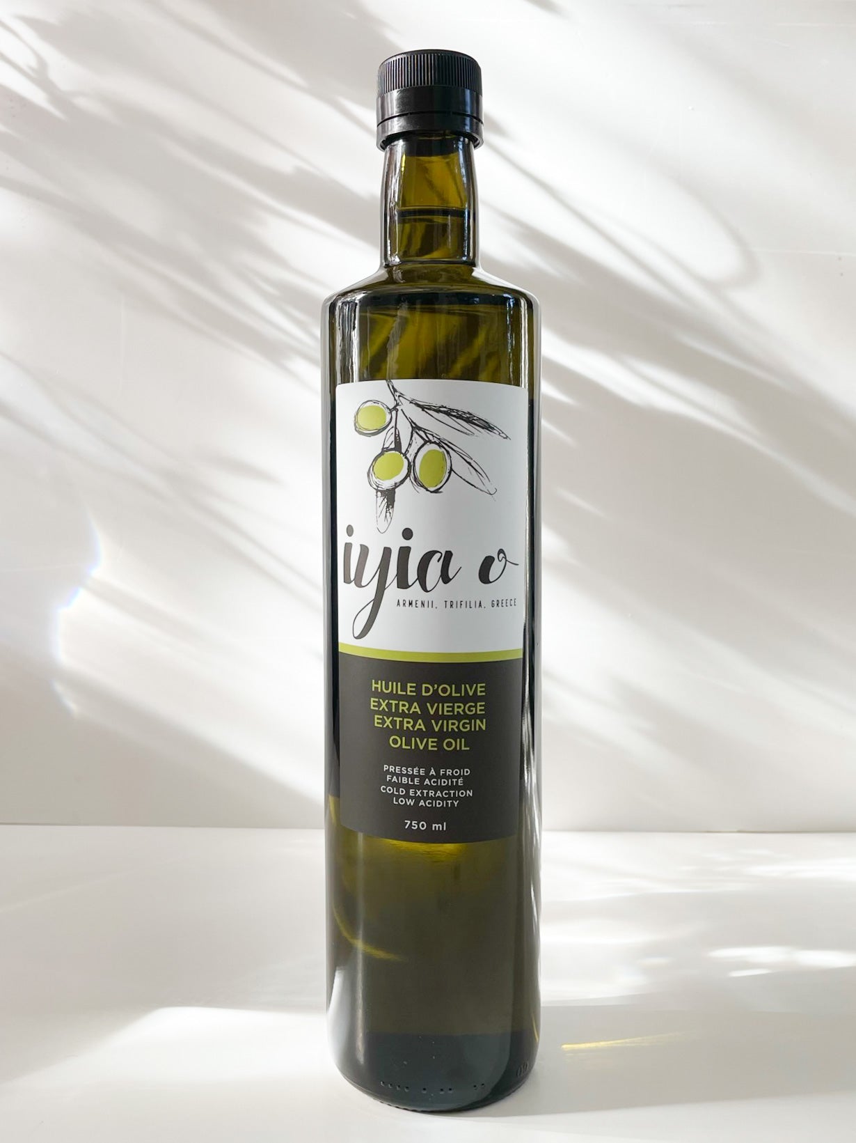 Iyia Food Group's Greek extra virgin olive oil in a 750ml dark glass bottle.
